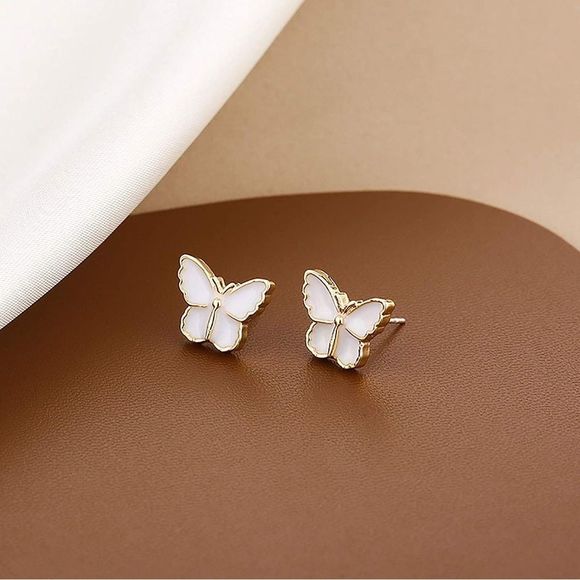 Tiny Petite beautiful pearl-colored butterfly earrings. - Picture 5 of 9